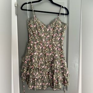 Green floral dress. Zip in the back. Tie waist. Size Small.